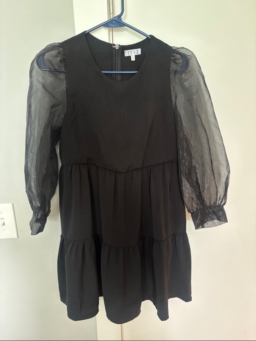 TCEC Black Tiered Mini Dress with Sheer Puff Sleeves